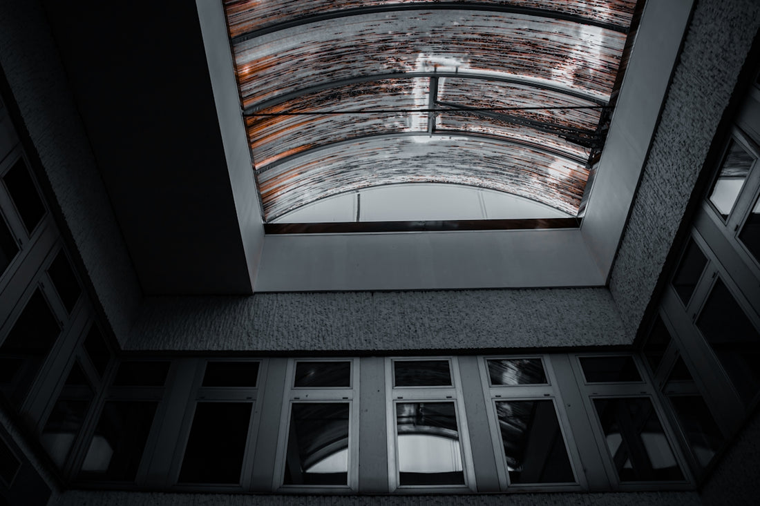 Looking up at a curved skylight from below